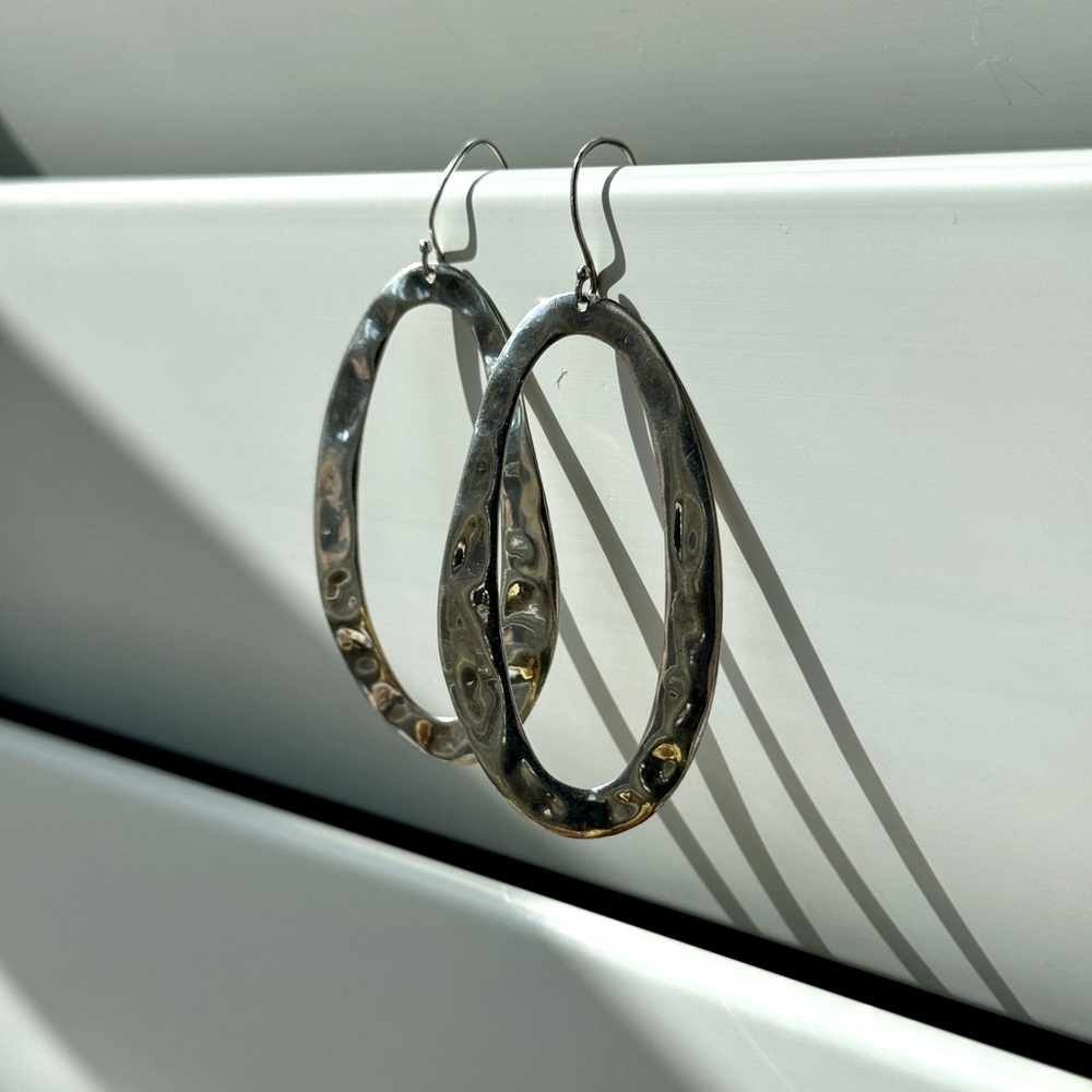 Wavy sterling silver oval drop earrings